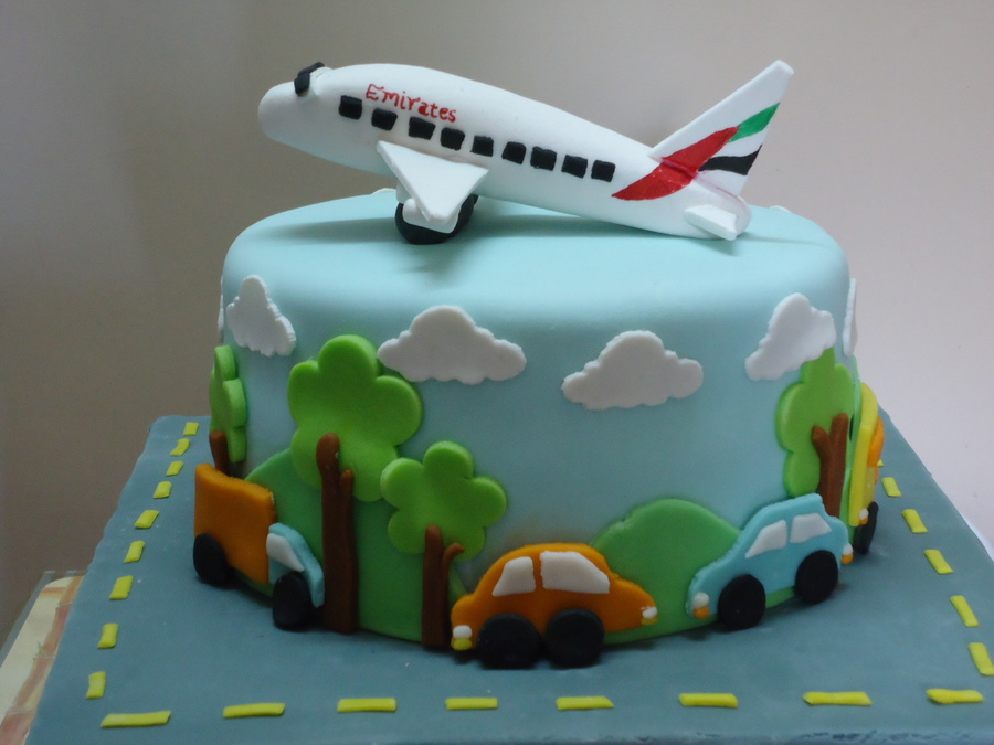 Boy with Aeroplane Cake